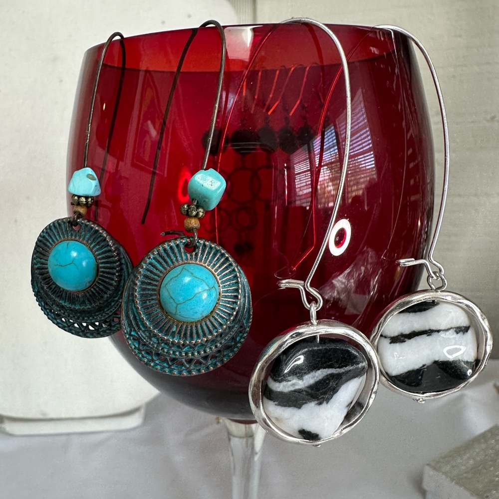 Three pair of long unusual hook jasper and boho earrings